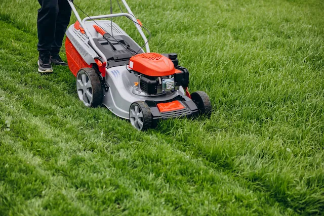 Strong Landscape crew mowing a lawn in Salt Lake City