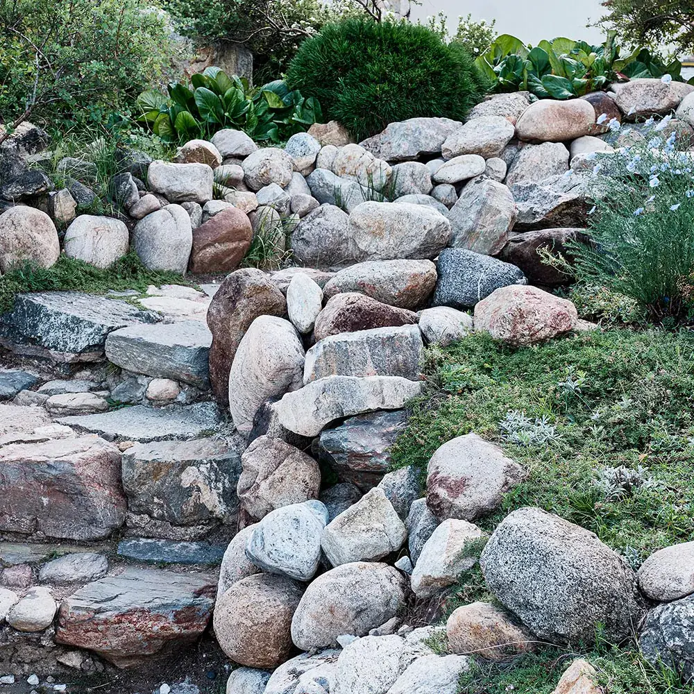 The Draper patio rebuild — Draper, UT · travertine + retaining wall